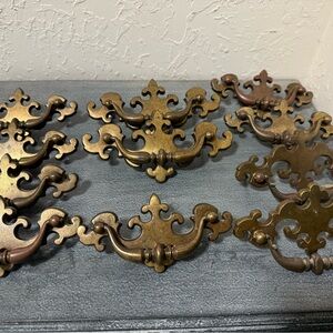 Large set of 11 Vintage brass mid century Chippendale batwing  drawer pulls